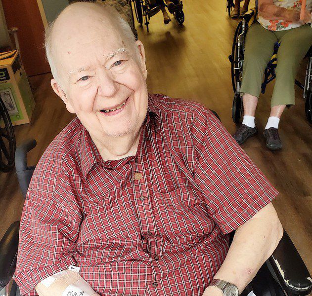 Students, friends serenade teacher through nursing home windows
